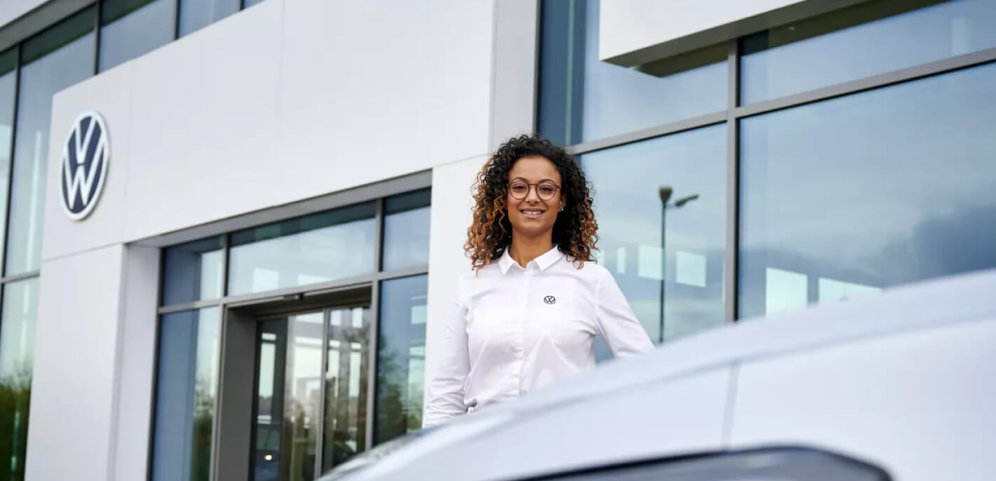 Volkswagen Dealership associate ready to assist.